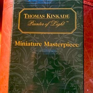 Thomas Kinkade framed pictures with easels